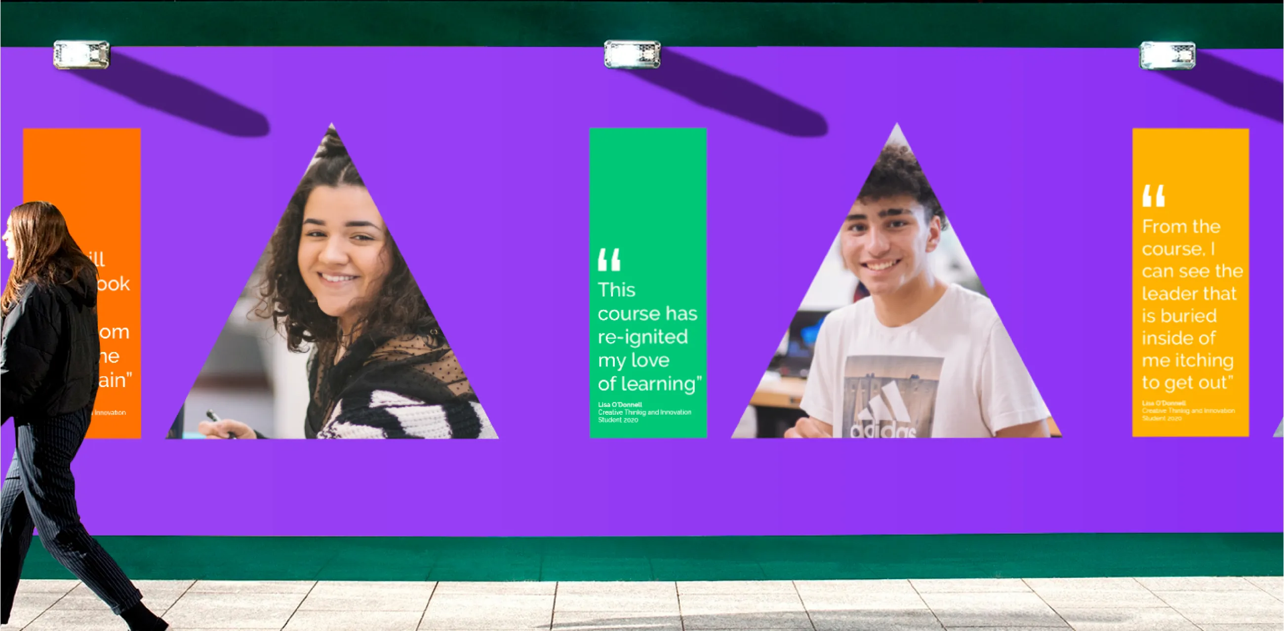 A billboard showing the IA branding and testimonials from past students and alumni